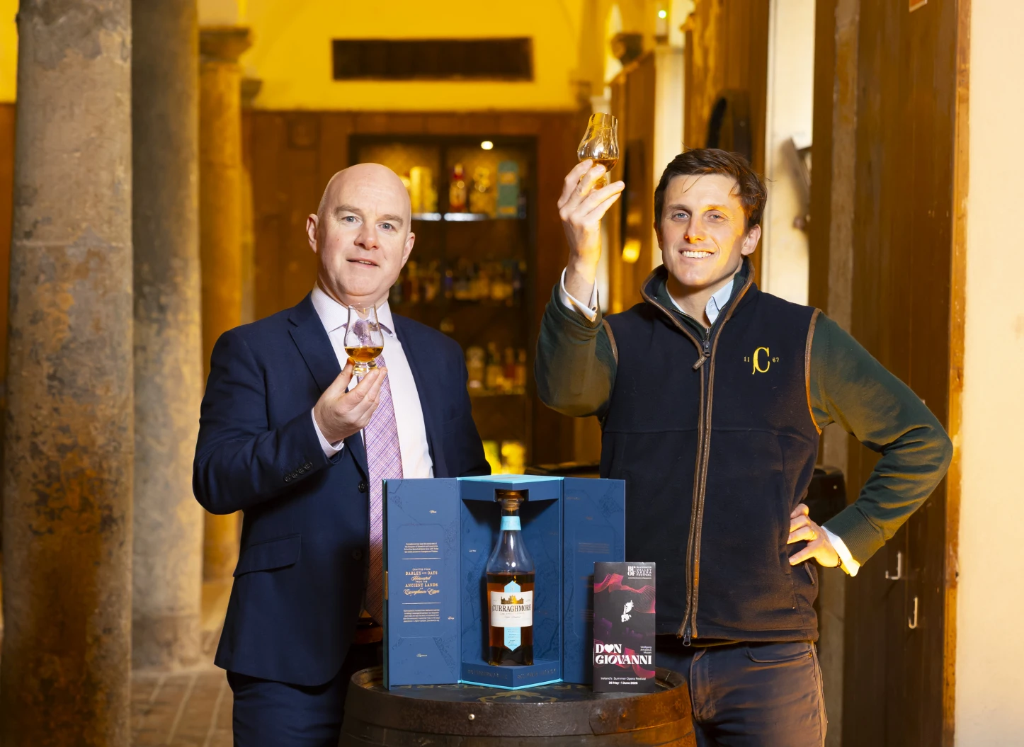 Festival director, Eamonn Carroll, and Curraghmore Whiskey's CEO, Richard De La Poer Beresford, toast the new partnership at Curraghmore Estate